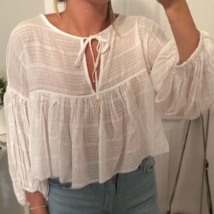Free people white flowy top